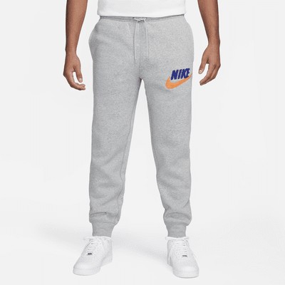 Джоггеры Nike Club Fleece, цвет Dark Grey Heather/Light Smoke Grey/Safety Orange