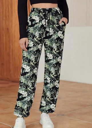 Спортивные брюки с тропическим принтом с карманом