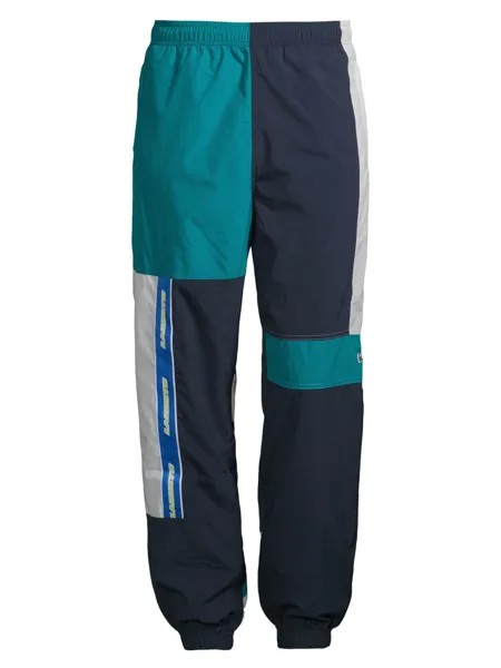 Спортивные брюки с завязками в технике пэчворк Lacoste, белый
