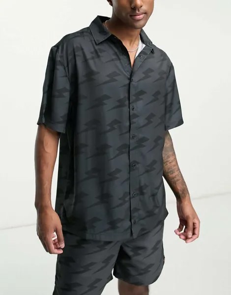 Черная однотонная рубашка ellesse Capri с принтом молний
