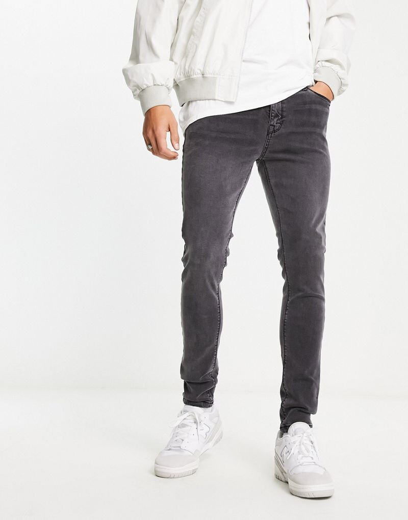 Черные эластичные джинсы ASOS DESIGN