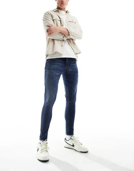 Темно-синие джинсы с эффектом стрейч ASOS DESIGN