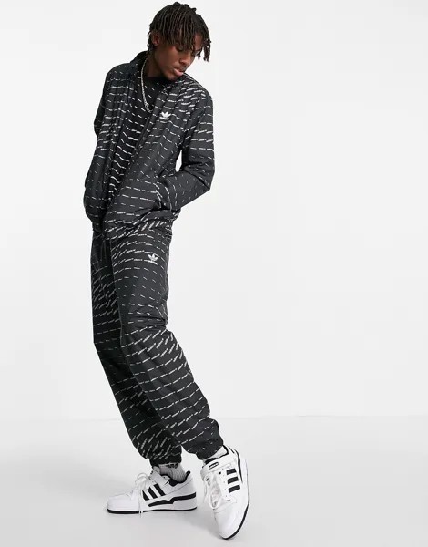 Черная спортивная куртка с повторяющимся логотипом adidas Originals