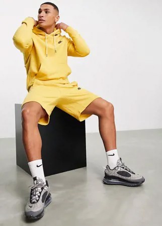 Бледно-горчичные шорты Nike Revival-Желтый