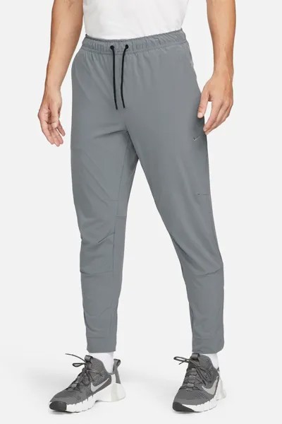 Спортивные брюки Unlimited с технологией Dri-FIT и прорезями на молнии Nike, серый