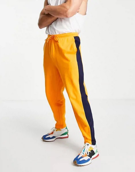 Оранжевые джоггеры в стиле oversized и колор блок ASOS DESIGN-Оранжевый цвет