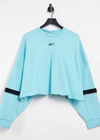 Бледно-голубой укороченный свитшот свободного кроя Reebok Training Plus
