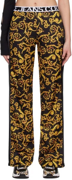 Черно-желтые спортивные штаны с рисунком Versace Jeans Couture