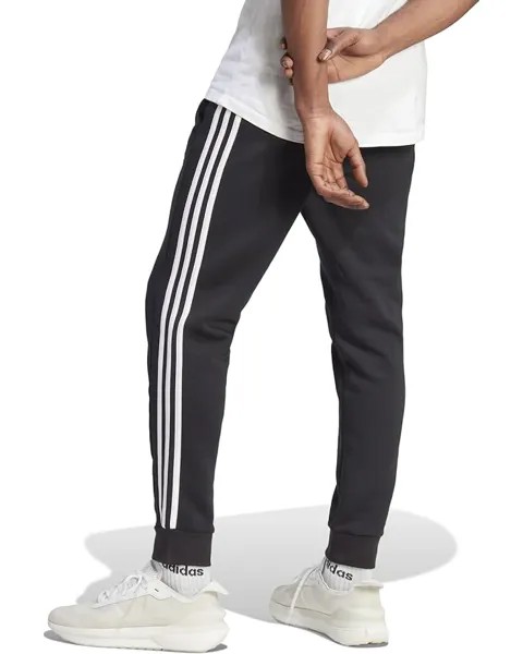 Брюки Adidas Essentials Fleece Tapered Cuffed 3-Stripes Pants, черный/белый