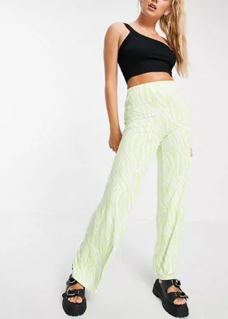 Трикотажные брюки с широкими штанинами и звериным принтом ASOS DESIGN-Зеленый цвет