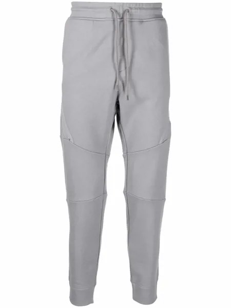 C.P. Company зауженные спортивные брюки с декором Lens