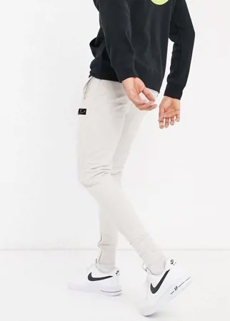 Серые узкие джоггеры с логотипом из флока The Couture Club-Серый