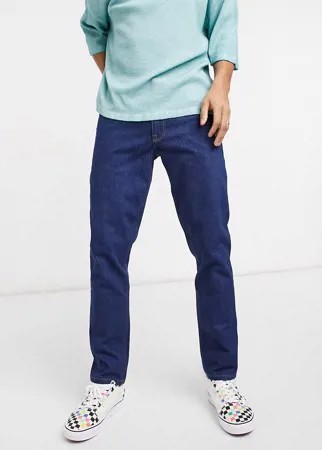 Эластичные зауженные джинсы необработанного выбеленного цвета индиго в стиле 70-х ASOS DESIGN-Голубой