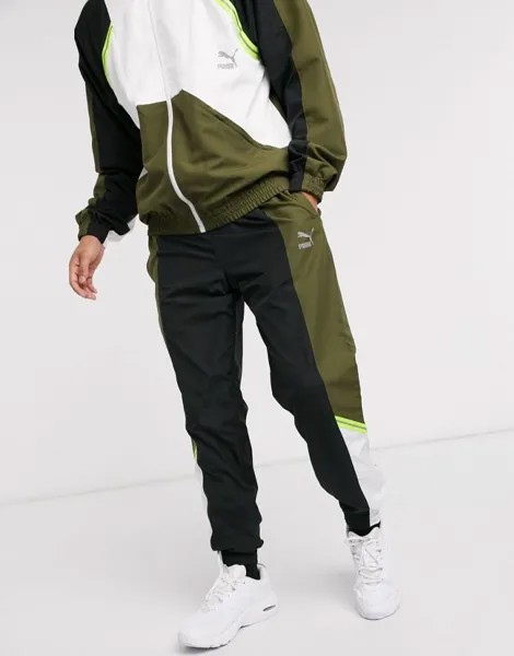 Тканые спортивные штаны Puma TFS цвета хаки