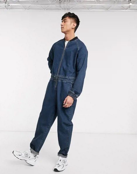 Свободный джинсовый комбинезон с эластичным воротом ASOS DESIGN-Синий