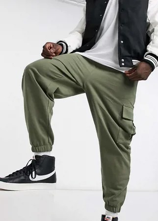 Oversized-джоггеры цвета хаки из органического хлопка с карманами карго ASOS DESIGN-Зеленый цвет