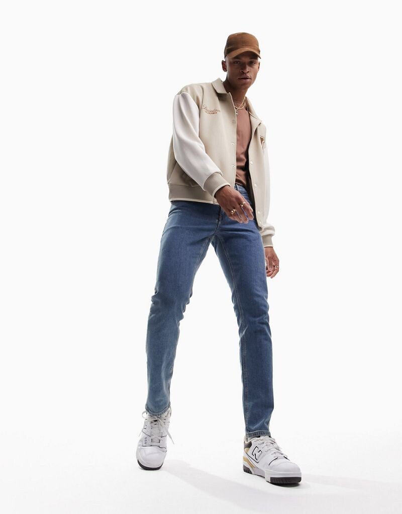 Синие узкие джинсы ASOS DESIGN средней потертости