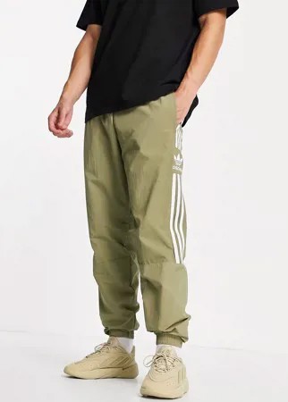 Джоггеры цвета хаки adidas Originals adicolor Lock Up-Зеленый цвет