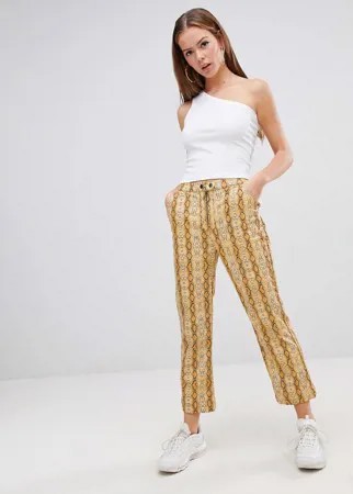 Брюки клеш из винила со змеиным узором ASOS DESIGN-Многоцветный