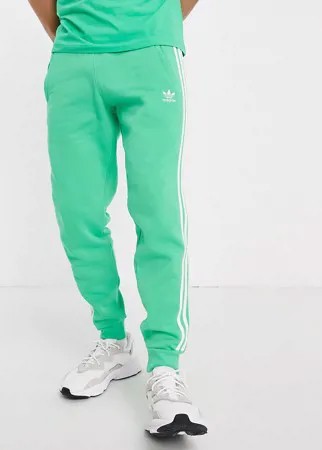 Зеленые джоггеры с тремя полосками adidas Originals adicolor-Зеленый цвет