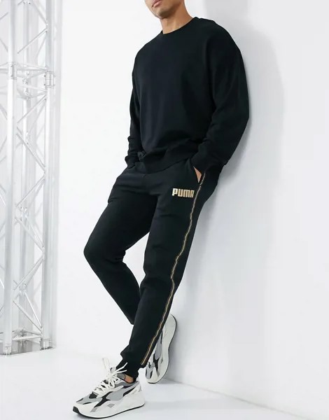 Джоггеры черного цвета с золотистой тесьмой PUMA-Черный