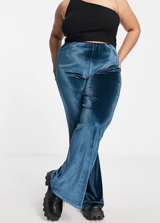 Расклешенные эластичные брюки из бархата темно-синего цвета ASOS DESIGN Curve-Темно-синий
