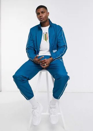 Тканая спортивная куртка синего цвета Puma Avenir-Синий