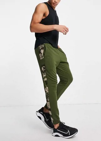 Суженные книзу джоггеры цвета хаки с камуфляжной отделкой Nike Training-Зеленый цвет