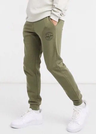 Зеленые спортивные штаны с манжетами и круглым логотипом Jack & Jones Originals-Зеленый цвет