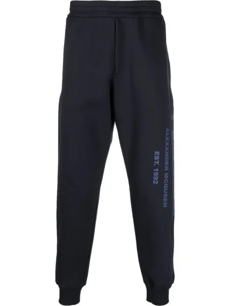 Alexander McQueen спортивные брюки с принтом граффити, синий