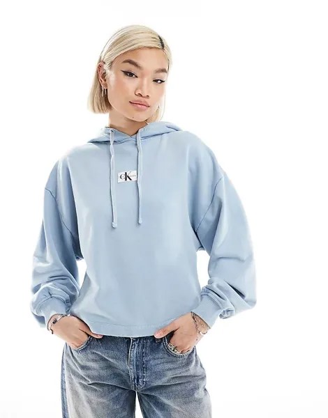 Худи синего цвета Calvin Klein Jeans – с тканым логотипом