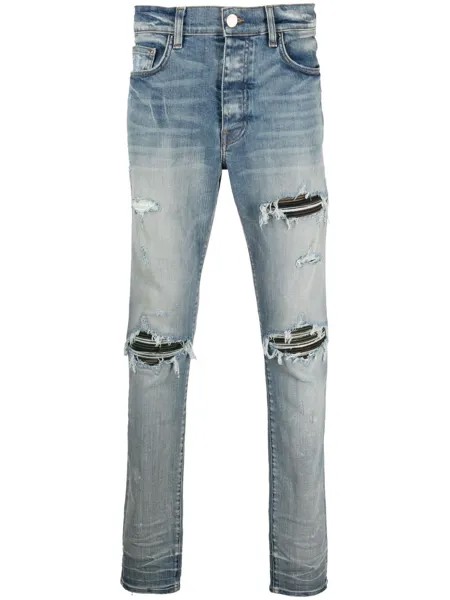 AMIRI узкие джинсы с прорезями