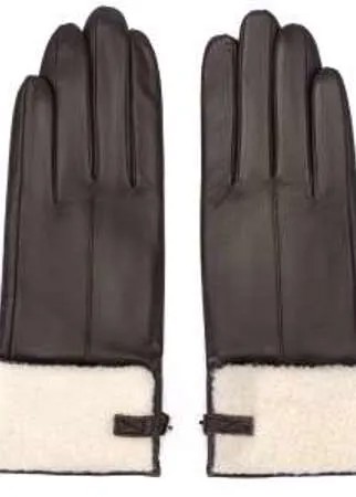 Кожаные перчатки темно-коричневого цвета с комбинированной подкладкой из шерсти и текстиля. Аксессуар премиальной линии ALLA PUGACHOVA украшен металлической фурнитурой по краю манжета.