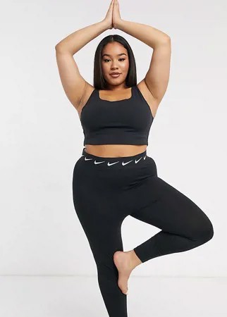Укороченный спортивный бюстгальтер черного цвета Nike Yoga Plus Luxe-Черный