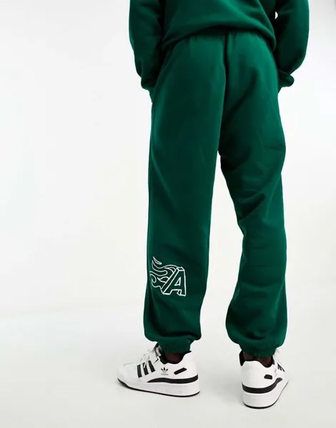 Темно-зеленые спортивные джоггеры adidas
