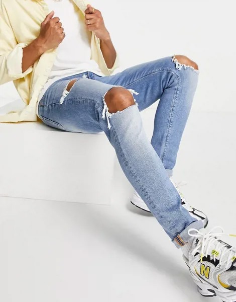 Светлые рваные джинсы скинни ASOS DESIGN-Голубой