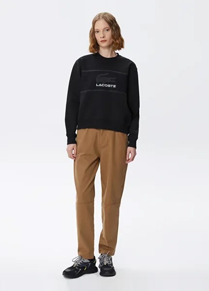 Черный женский свитшот свободного кроя с круглым вырезом и принтом Lacoste