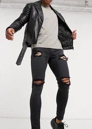 Черные джинсы с напылением и рваной отделкой ASOS DESIGN-Черный цвет