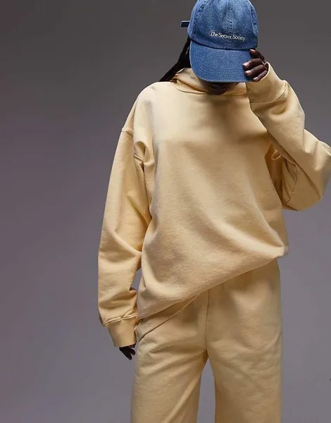 Topshop – худи бледно-желтого цвета со спущенными плечами и эффектом выстиранности