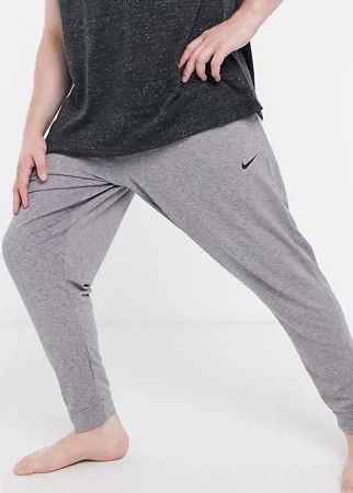 Серые джоггеры Nike Yoga Plus-Серый