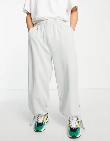 Светло-серые широкие oversized-джоггеры с завязками по бокам ASOS DESIGN-Серый
