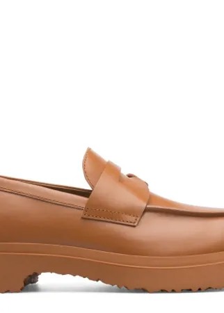 Brown leather loafers with lightweight outsoles and a OrthoLite® cushioned footbed.