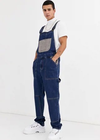 Свободный джинсовый комбинезон с карманами в клетку ASOS DESIGN-Синий