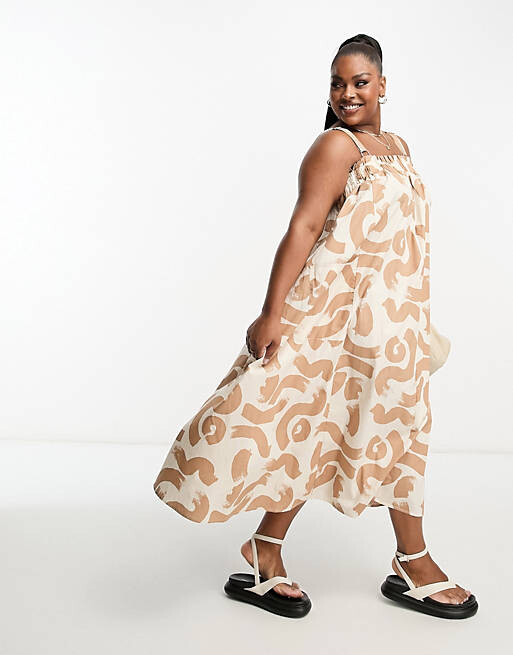 Коричневый сарафан миди из хлопкового комбинезона трапеции ASOS DESIGN Curve с абстрактным принтом
