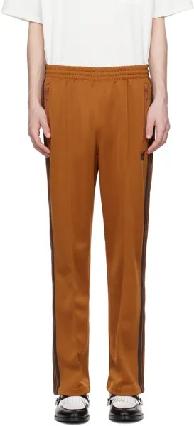 Оранжевые спортивные штаны на кулиске Needles