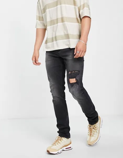 Черные эластичные узкие джинсы с прорехами ASOS DESIGN-Черный цвет