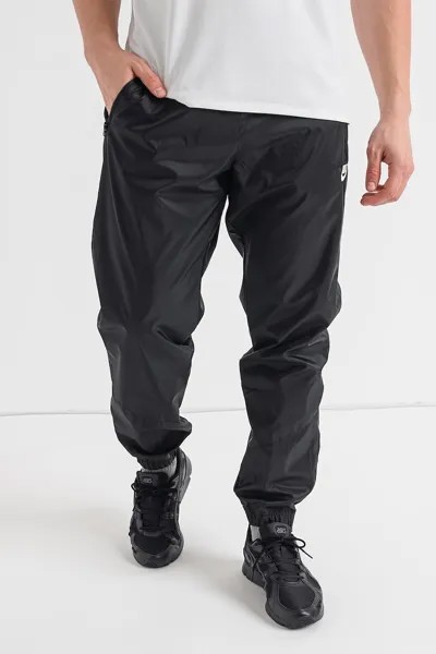 Спортивные брюки Windrunner с разрезами на молнии на щиколотке Nike, черный