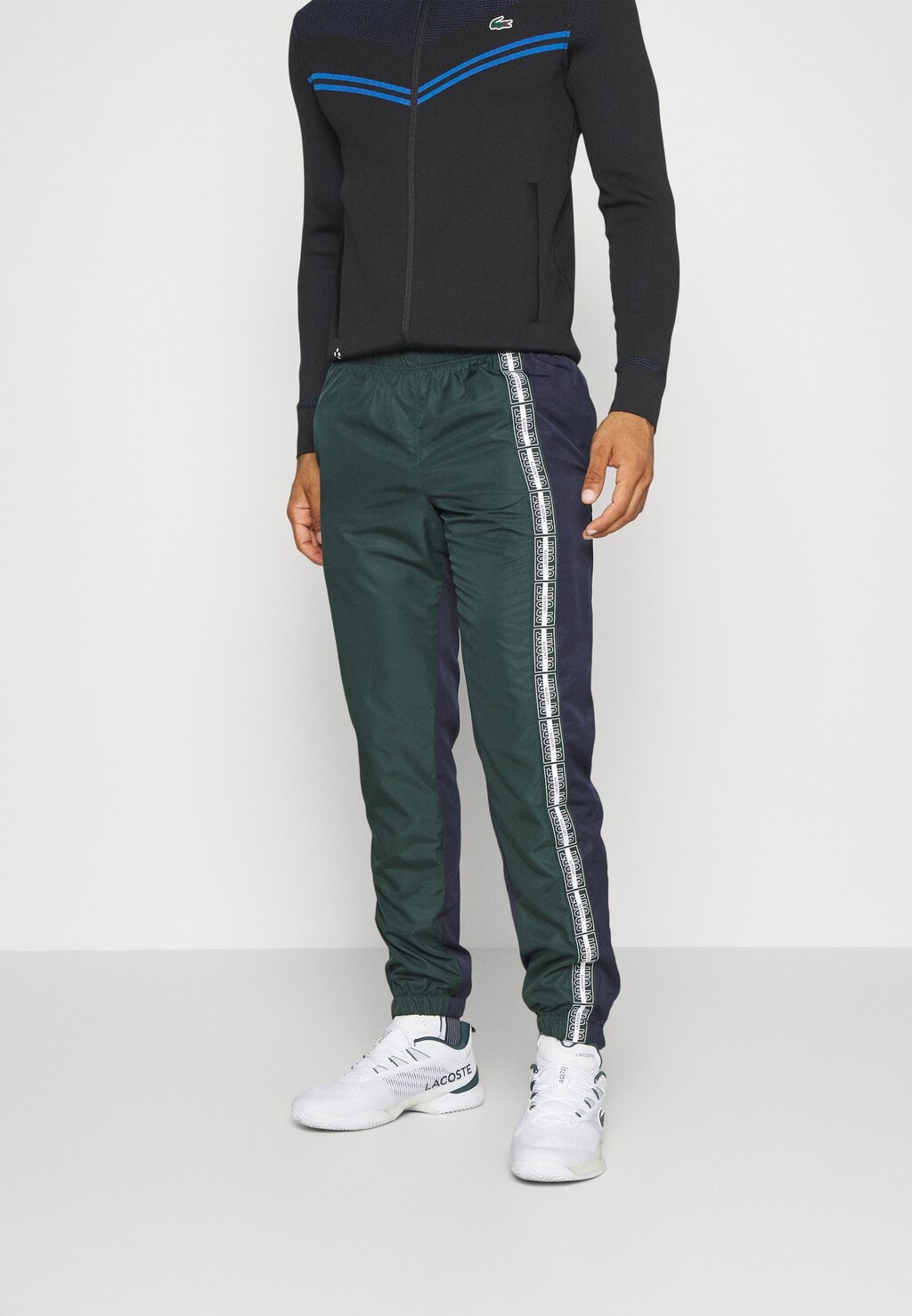 Спортивные брюки Tennis Pant Lacoste, цвет vert bleu/marine