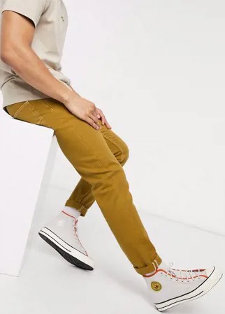 Узкие джинсы горчичного цвета ASOS DESIGN-Желтый