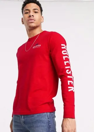 Красный лонгслив с логотипом на груди и рукаве Hollister